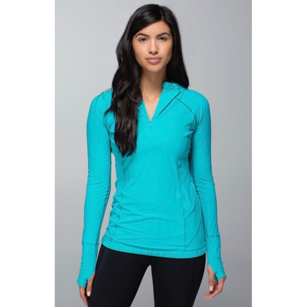 Lululemon Water Bound Hoodie
Blue Tropics Half Zip Running Top Thumbholes Size 4